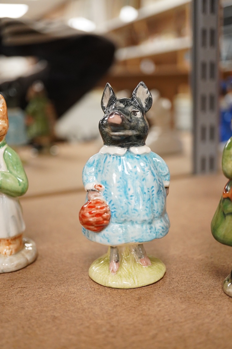Four Beatrix Potter Beswick figures; Simpkin, Ginger, Miss Moppet and Pig-Wig, largest 10cm high